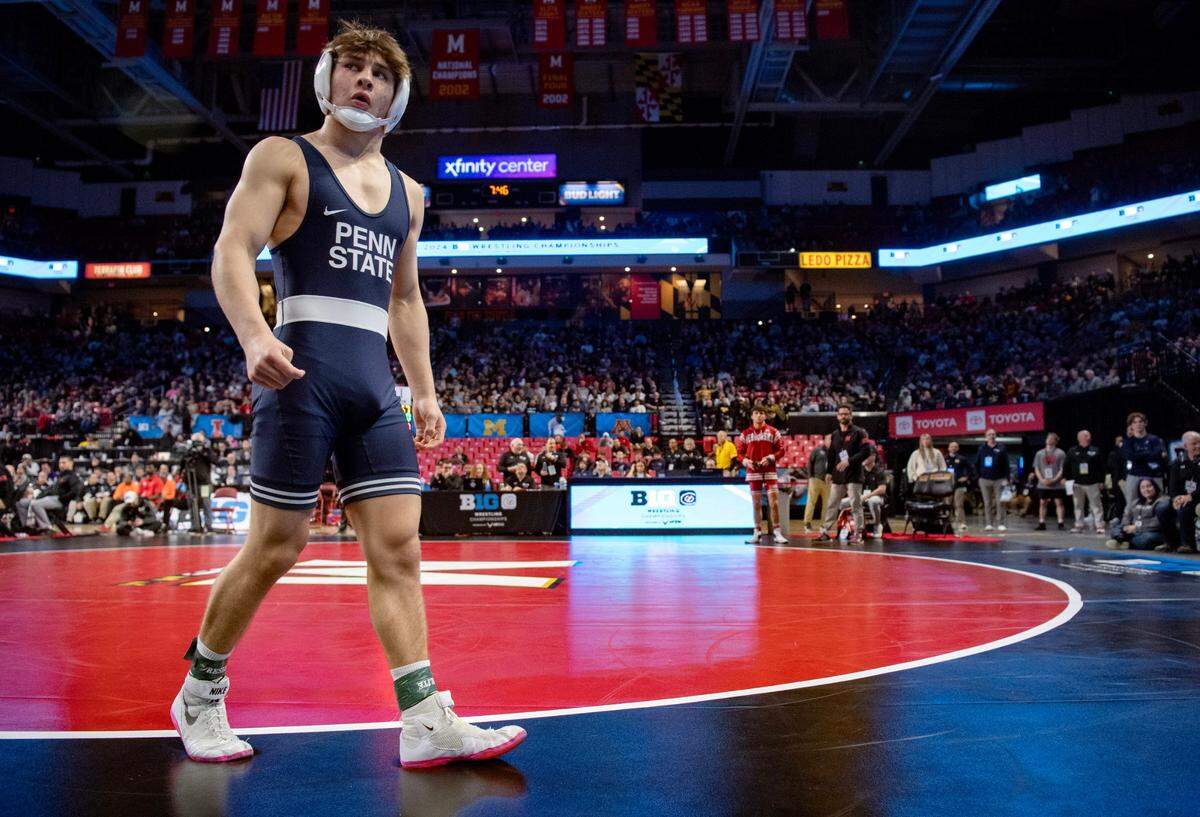 Penn State’s Tyler Kasak walks along the edge of the mat as he waits for his 149 lb semifinal bout of the Big Ten Wresting Championships at the Xfinity Center at the University of Maryland on Saturday, March 9, 2024.