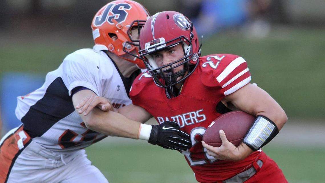 Bellefonte’s Austin Jackson gets past Jersey Shore’s Jarett Guthrie during the Red Raiders’ 14-6 loss on Friday.
