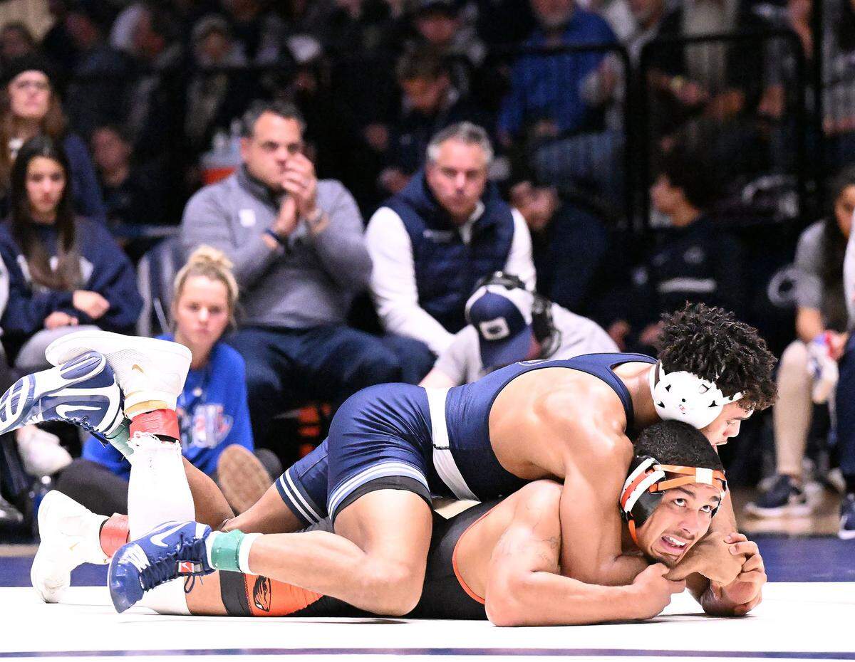 Penn State’s Carter Starocci controls Oregon State’s Aaron Olmos in the 174-pound bout on Sunday, Dec. 11, 2022 at Rec Hall in State College. Starocci defeated Olmos in a major decision. Penn State defeated Oregon State, 31-3.