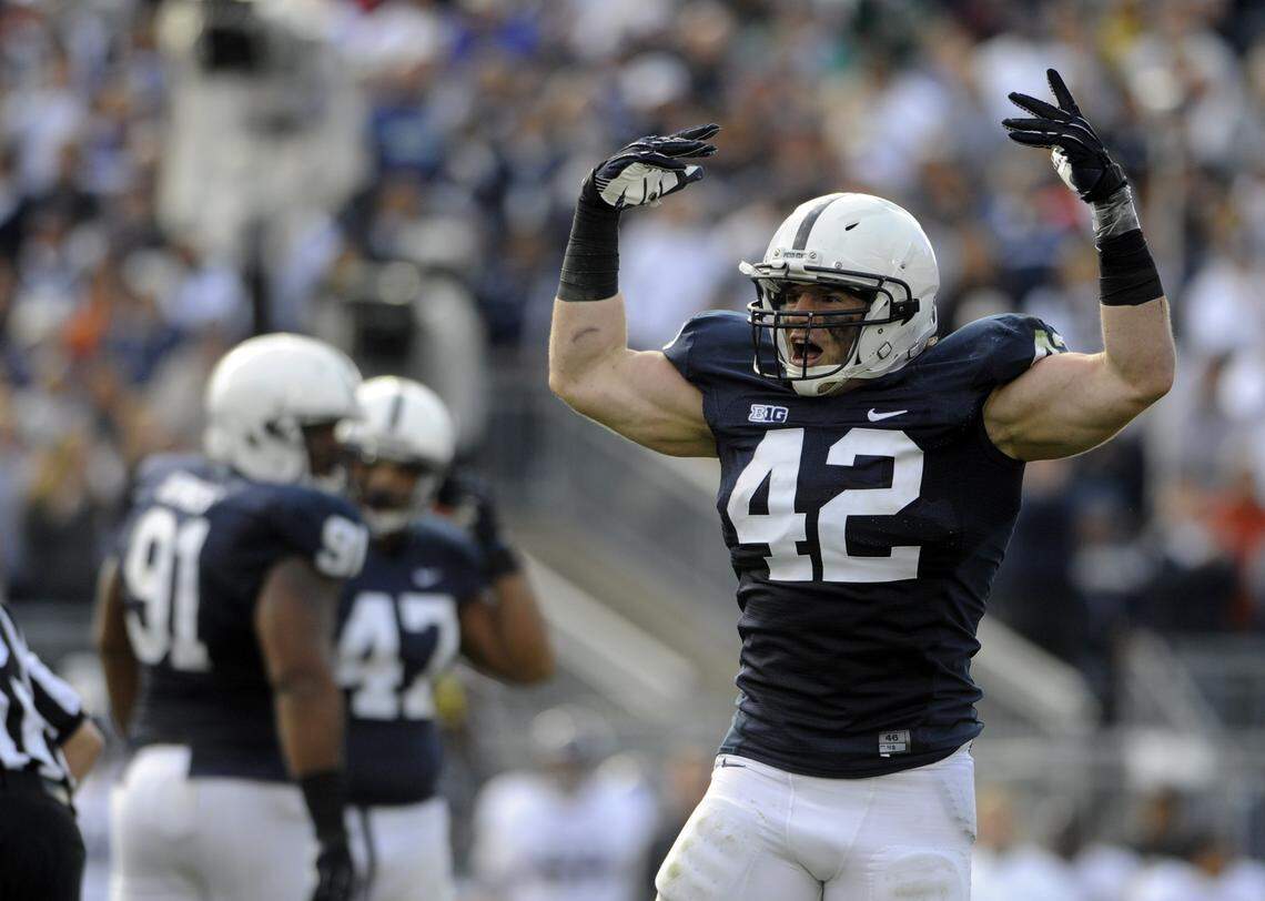 Michael Mauti tries to fire up the crowd against Northwestern. Penn State beat Northwestern 39-28 at Beaver Stadium on Saturday, October 6, 2012.