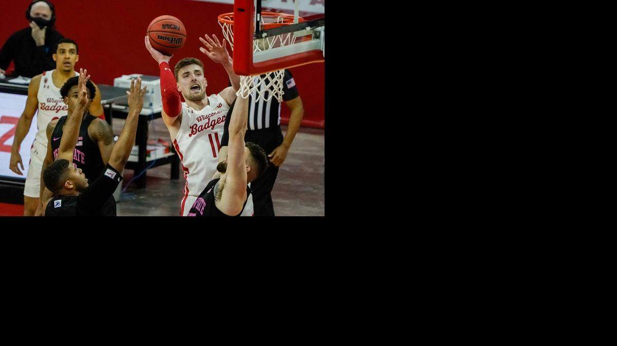 Wisconsin’s Micah Potter shoots during the second half of an NCAA college basketball game against Penn State Tuesday, Feb. 2, 2021, in Madison, Wis. (AP Photo/Morry Gash)