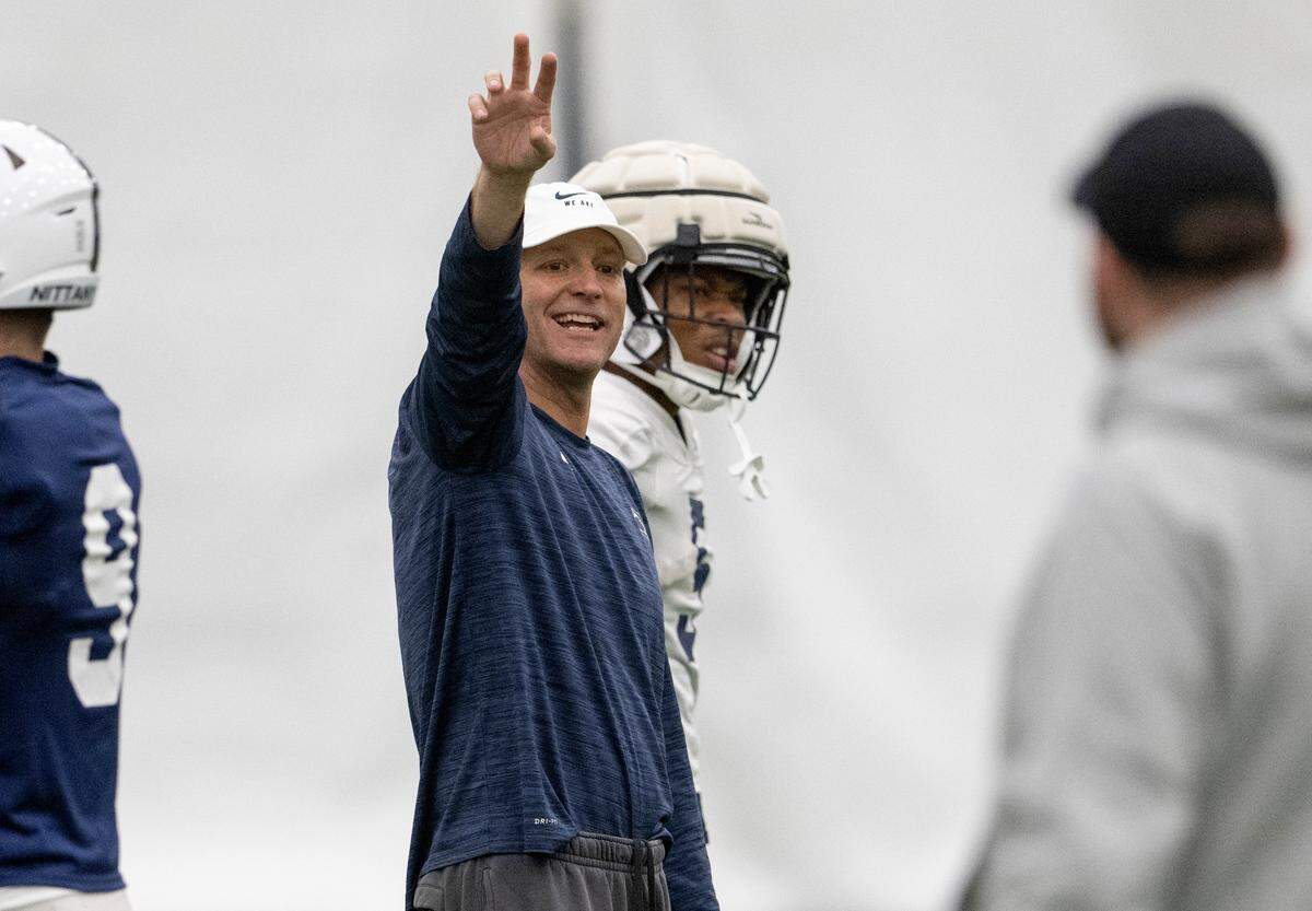 Penn State offensive coordinator Mike Yurcich yells to the offense during practice on Wednesday, Oct. 26, 2022.