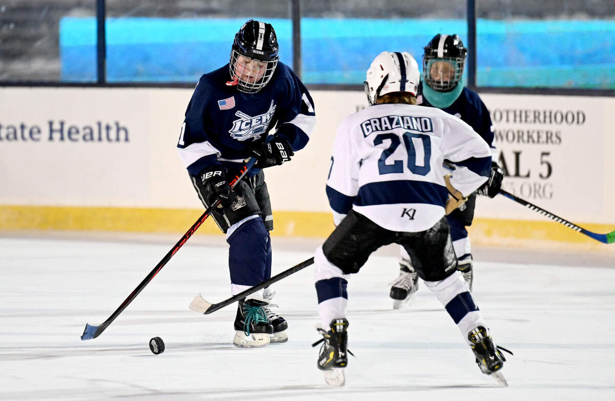 Adam Richardson skates down the ice with the puck as the Icers 10U team played on the ice in Beaver Stadium on Wednesday, Jan. 28, 2026.