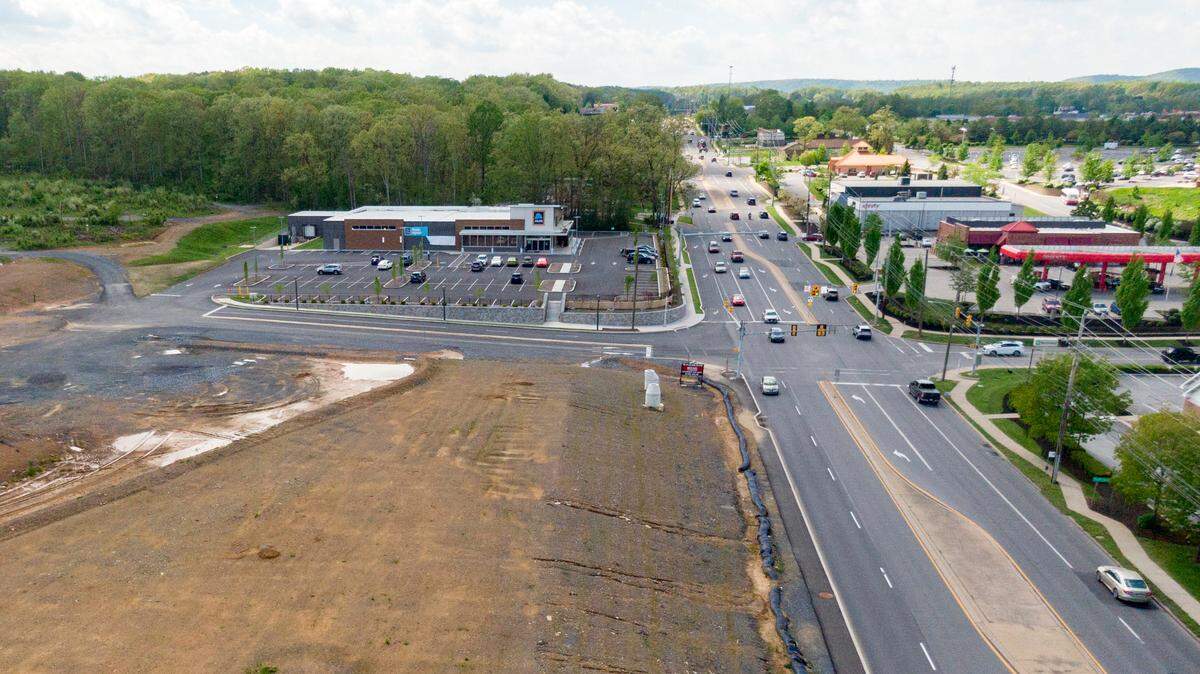Traffic moves along North Atherton Street near the Aldi and Sheetz on May 19, 2022.