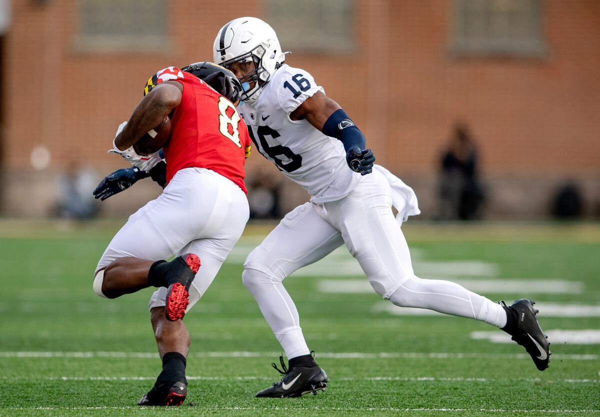 Penn State safety Ji’Ayir Brown stops Maryland running back Tayon Fleet-Davis during the game on Saturday, Nov. 6, 2021.