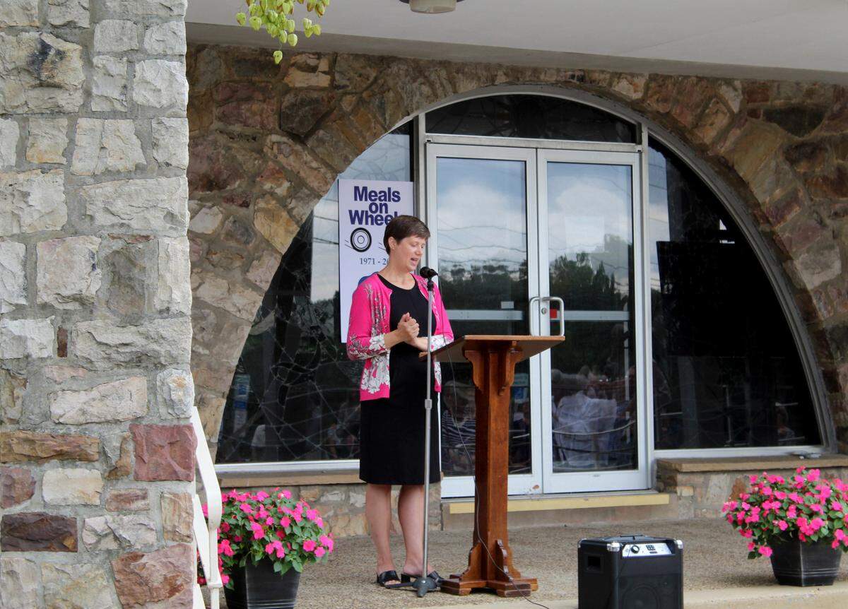 Sharon Ambrose, State College Area Meals on Wheels board president, speaks during the nonprofit’s 50th anniversary celebration on Monday.
