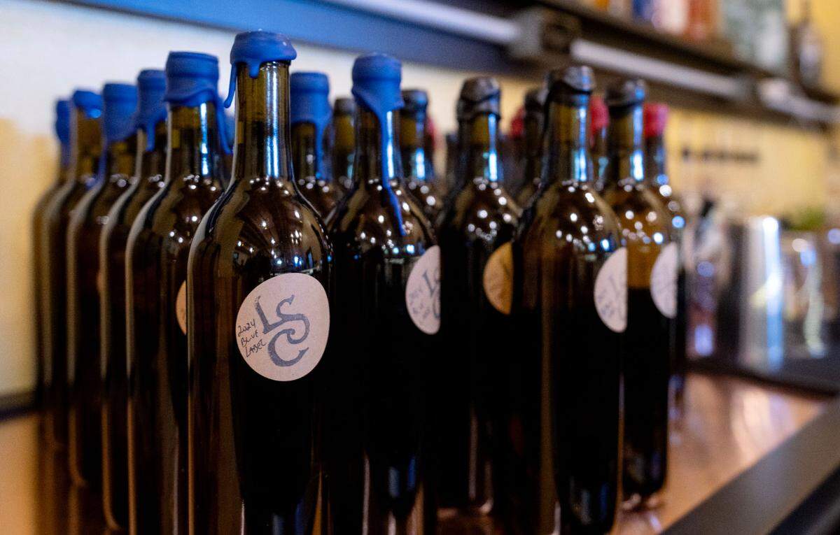 Bottoles of Lauren Spring Cidery’s 2024 Blue Label, a semi-sweet, velvety cider.