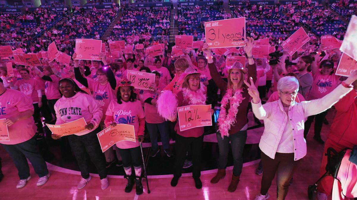 Breast cancer survivors celebrate during the Pink Zone celebration Sunday, Feb. 25, 2018, at the Bryce Jordan Center.