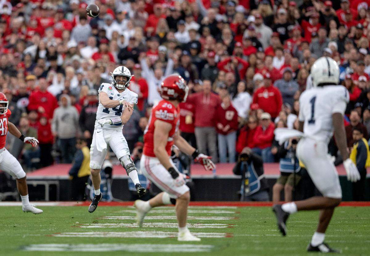 Penn State quarterback Sean Clifford makes a pass to wide receiver KeAndre Lambert-Smith for a first down during the second quarter of the Rose Bowl game against Utah on Monday, Jan. 2, 2023.