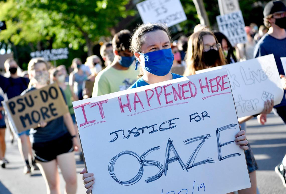 Hundreds of people march through downtown State College during a “Justice for Black Lives” protest organized by the 3/20 Coalition on Sunday, June 7, 2020.