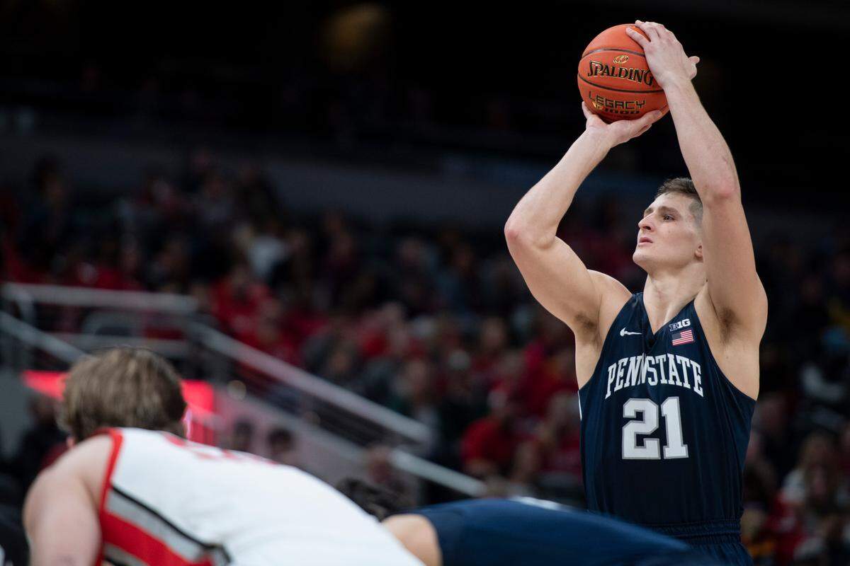 Penn State forward John Harrar (21) shoots a free throw during a March 10 game between Penn State and Ohio State in the Big Ten men’s basketball tournament at Gainbridge Fieldhouse in Indianapolis, Ind.