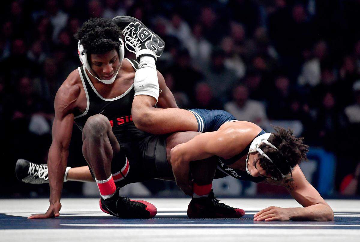 Ohio State’s Jordan Decatur grapples with Penn State’s Roman Bravo-Young in the 133-pound bout of the dual on Saturday, Feb. 15, 2020 at the Bryce Jordan Center. Bravo-Young won, 10-4.