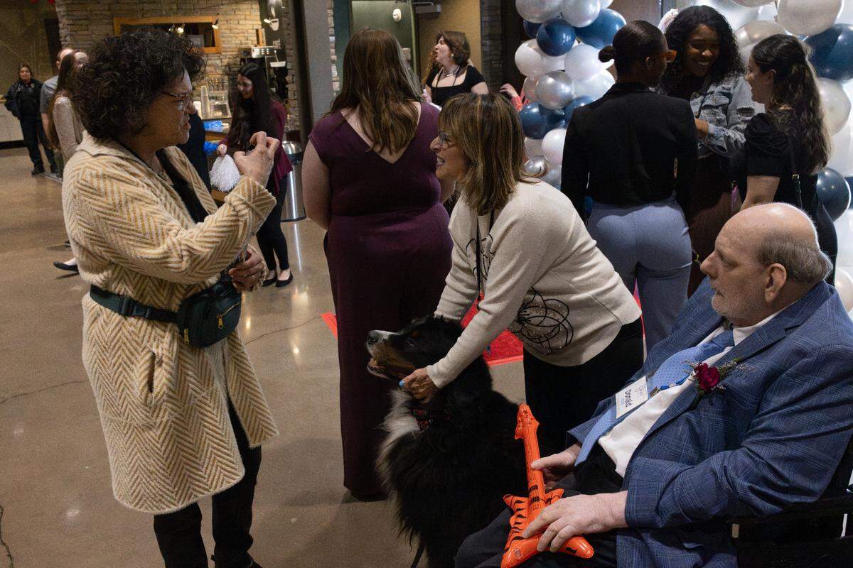 People chatting during the Night to Shine on Friday, Feb. 7, 2025.