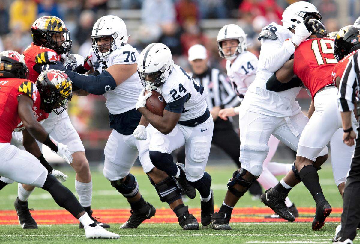 Penn State running back Keyvone Lee cuts through Maryland defenders during the game on Saturday, Nov. 6, 2021.