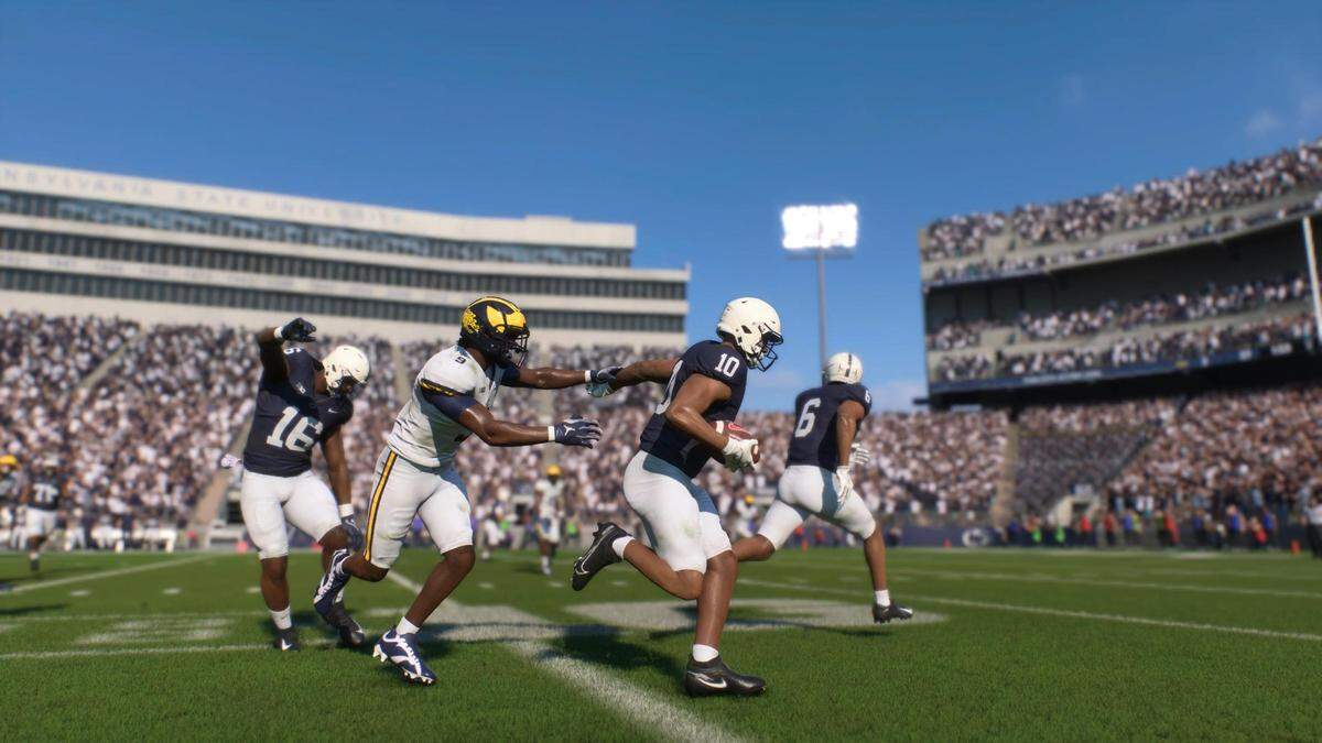 Penn State running back Nick Singleton runs down the sideline against Michigan in EA Sports’ College Football 25 video game, which was released Monday afternoon.