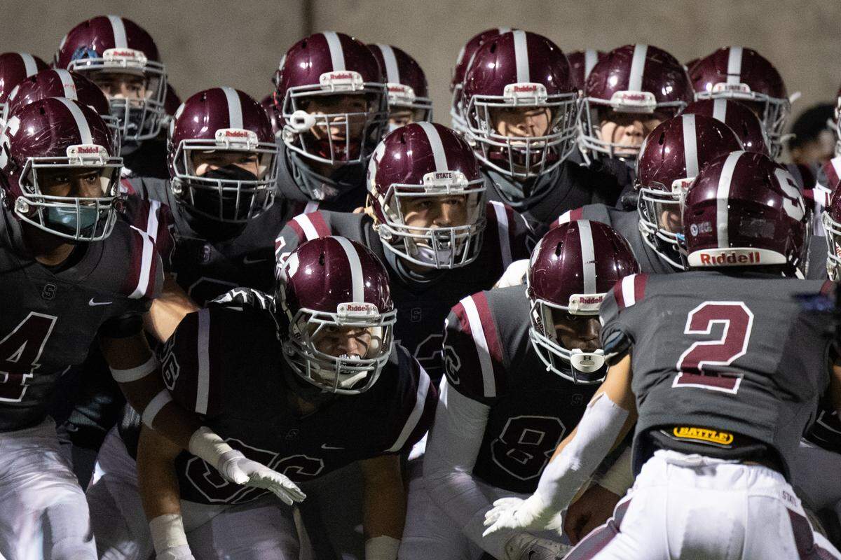 The Little Lions enter the field before State College’s game against Hollidaysburg at Memorial Field on Friday, Nov. 13, 2020 in State College.