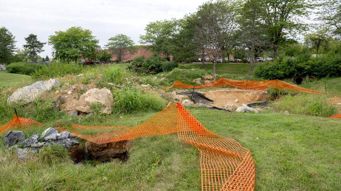A sinkhole on the corner of College Avenue and Shiloh Road on Friday, Aug. 16, 2024.