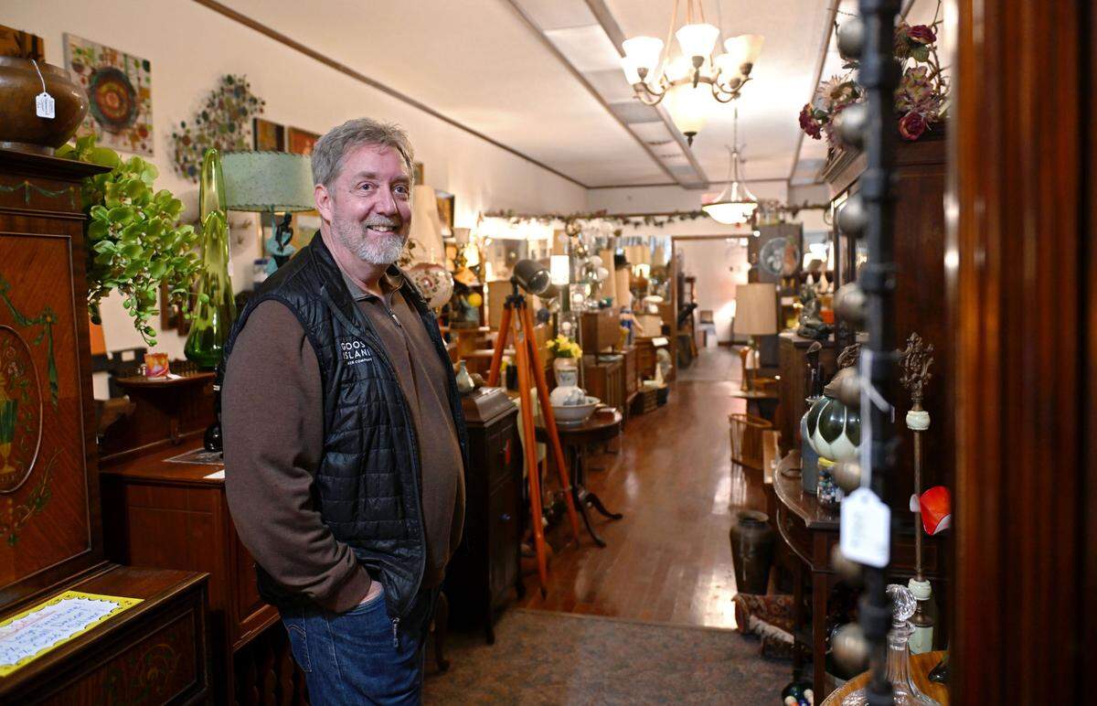 Mitch Bradley, owner of Victorian House Antiques, talks about some of the pieces he has available at his store on S. Allegheny Street in Bellefonte on Thursday, Jan. 9, 2025.