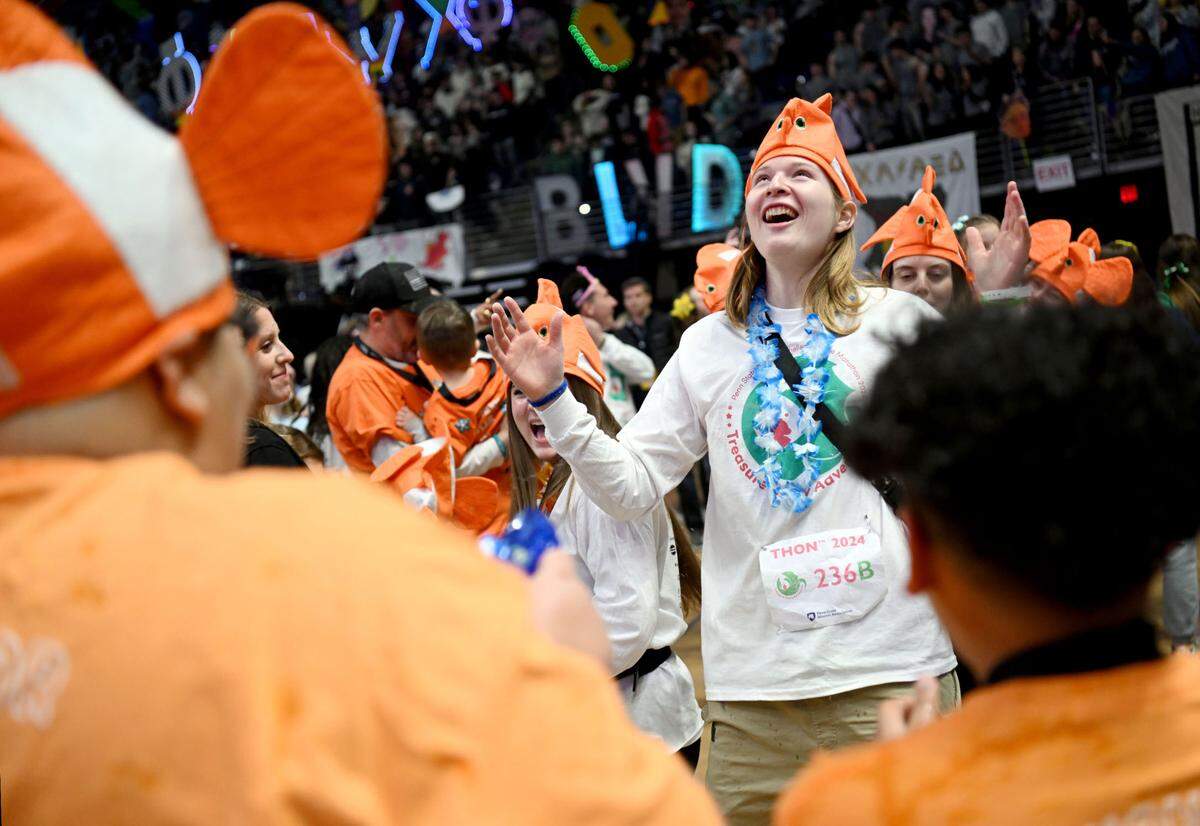 Dancer for Ohana Giuseppe Silimperi reacts as he’s hit with water from a squirt gun during the Penn State IFC/Panhellenic Dance Marathon on Friday, Feb. 16, 2024 at the Bryce Jordan Center.
