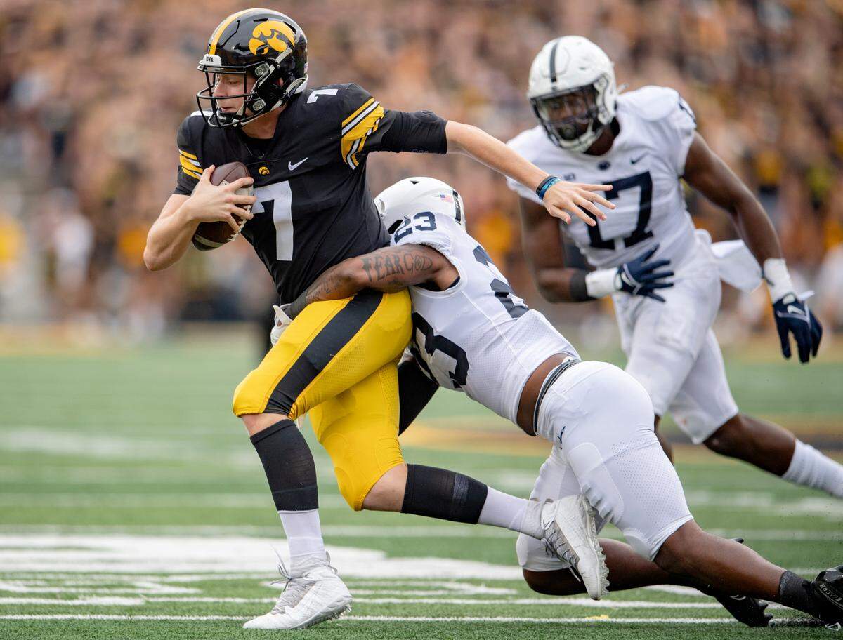 Penn State linebacker Curtis Jacobs sacks Iowa quarterback Spencer Petras during the game on Saturday, Oct. 9, 2021 at Kinnick Stadium.