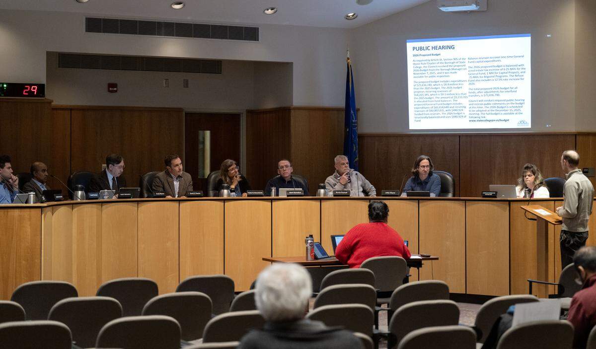 State College Borough Council members Josh Portney, Gopal Balachandran, Evan Myers, Ezra Nanes, Nalini Krishnankutty, Matt Herndon, Kevin Kassab and John Hayes listen to public comment during the Monday, Dec. 1, 2025 meeting. 