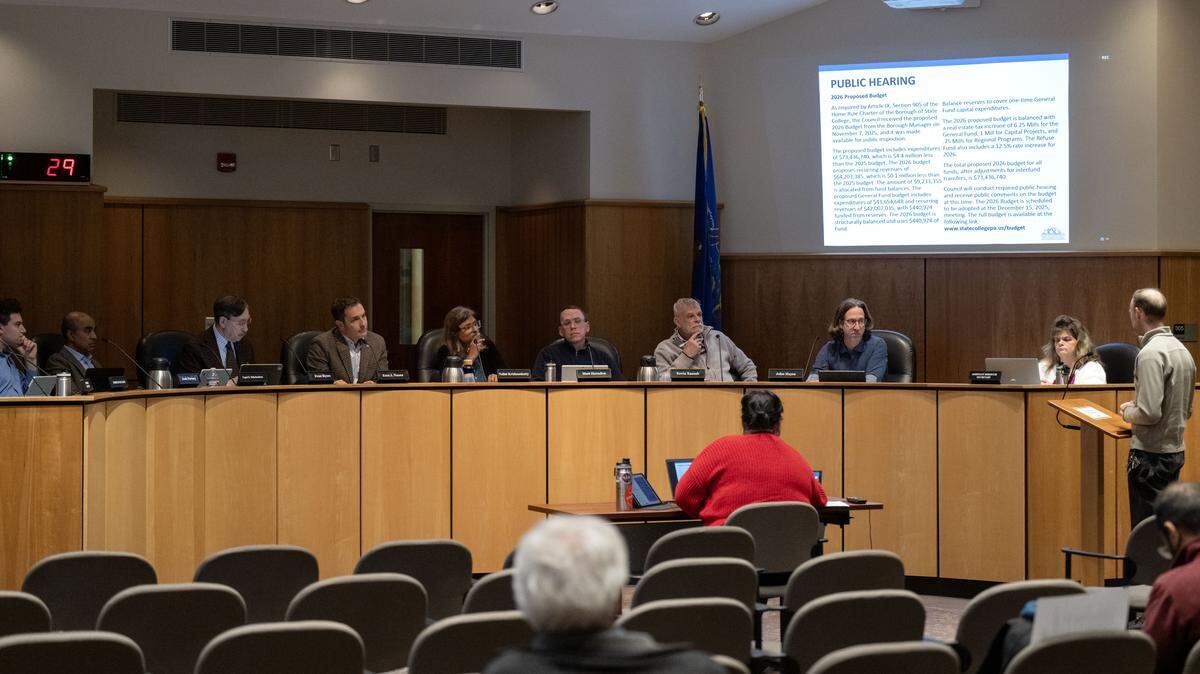 State College Borough Council members Josh Portney, Gopal Balachandran, Evan Myers, Ezra Nanes, Nalini Krishnankutty, Matt Herndon, Kevin Kassab and John Hayes listen to public comment during the Monday, Dec. 1, 2025 meeting.