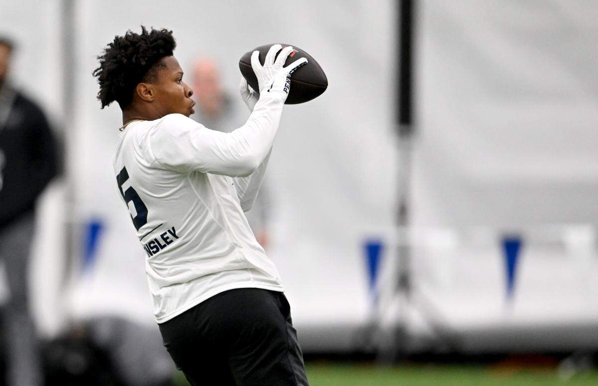 Wide receiver Mitch Tinsley makes a catch during position drills at Penn State football’s Pro Day on Friday, March 24, 2023.
