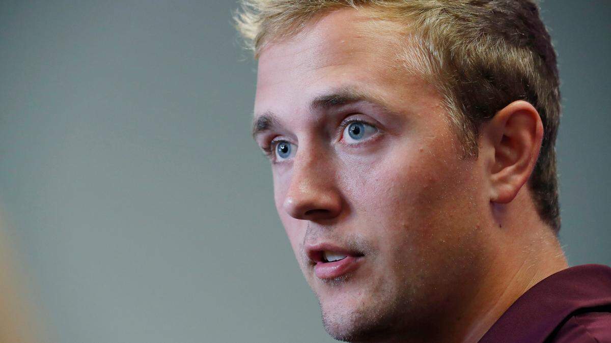 In this Aug. 10, 2019, file photograph, Mississippi State quarterback Tommy Stevens answers a reporter’s question about competition among quarterbacks in preseason camp as they prepare for the upcoming NCAA college football season during media day, in Starkville, Miss. (AP Photo/Rogelio V. Solis, File)
