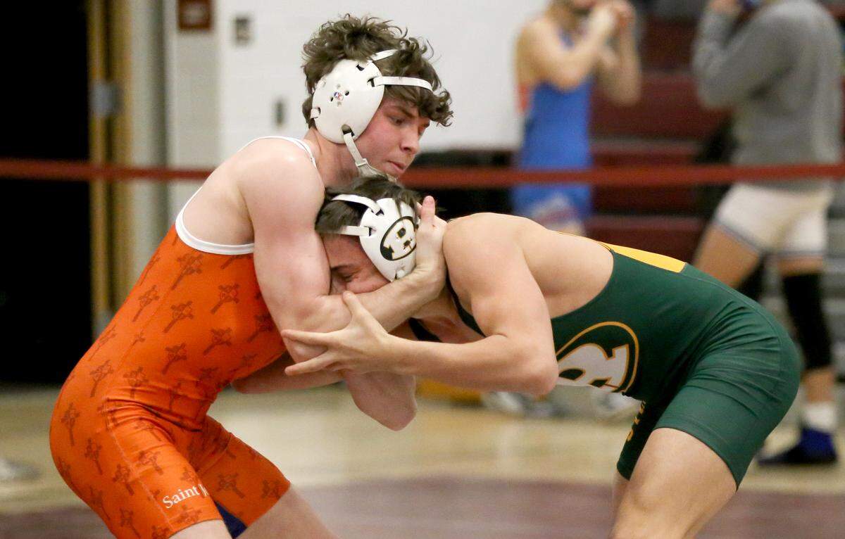Saint Joseph’s Zach Witmer wrestling Jackson Arrington in the 132-pound championship bout at the District 6 AA wrestling on Saturday, Feb. 20, 2021.