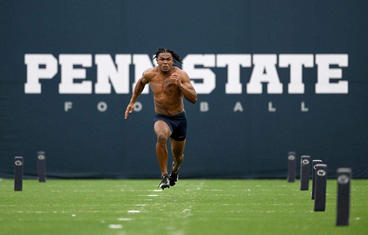 Safety Ji’Ayir Brown runs the 40 yard dash during Penn State football’s pro day on Friday, March 24, 2023.