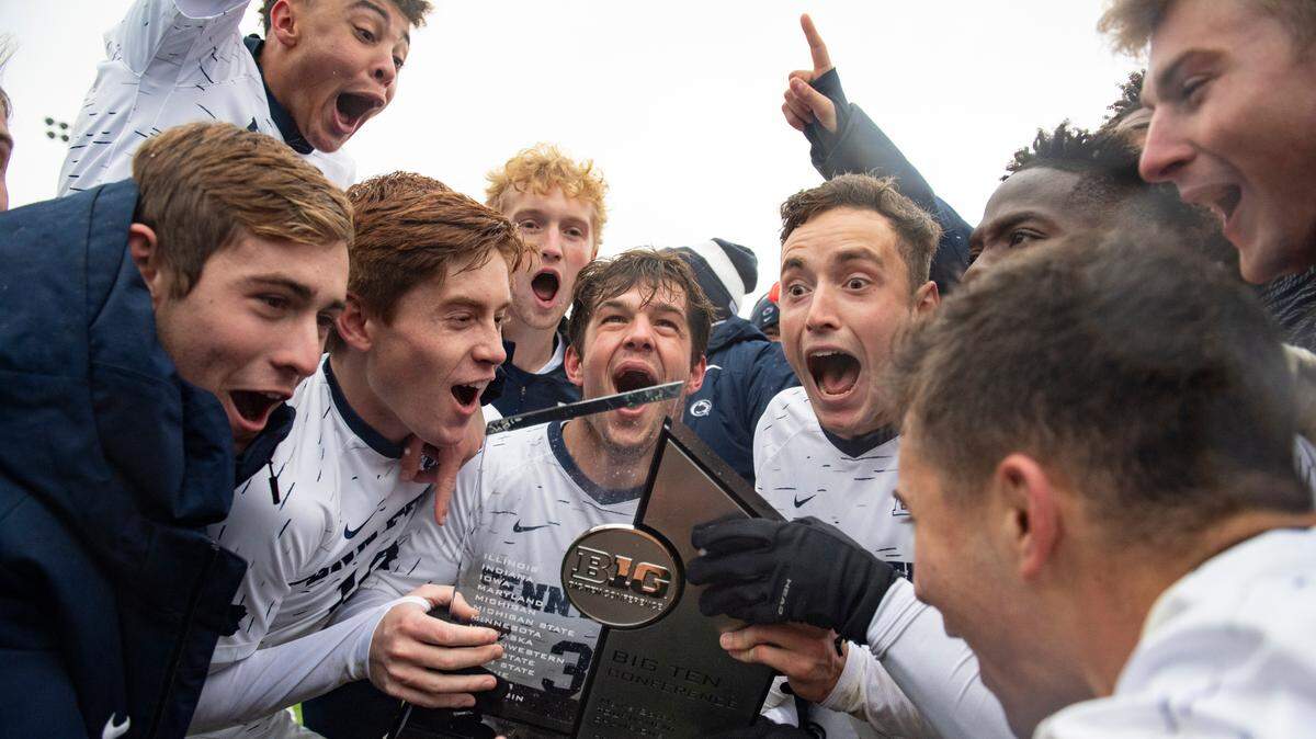 Penn State lifts the Big Ten Tournament trophy after winning the Big Ten Soccer Tournament Final between Penn State and Indiana at Jeffrey Field on Sunday, Nov. 14, 2021 in State College, Pa. The Nittany Lions defeated the Hoosiers 3-0 to win the 2021 Big Ten Men’s Soccer Tournament.