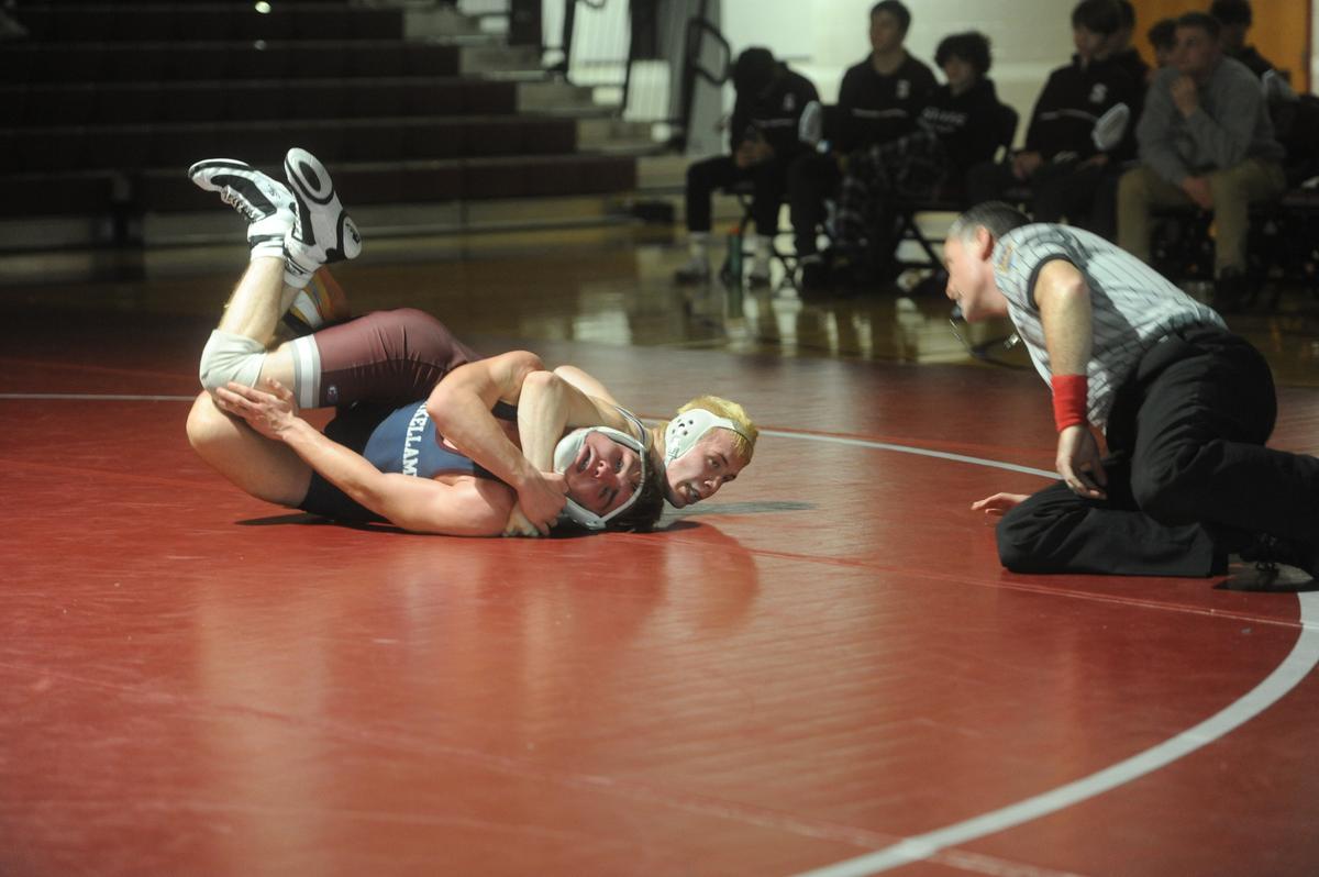 State College’s Pierson Manville scores near-fall points on Shikellamy’s CJ Keener in their 145-pound bout of the Little Lions’ 36-35 loss on Wednesday, Dec. 7, 2022. Manville racked up a 21-4 technical fall in 5:02.