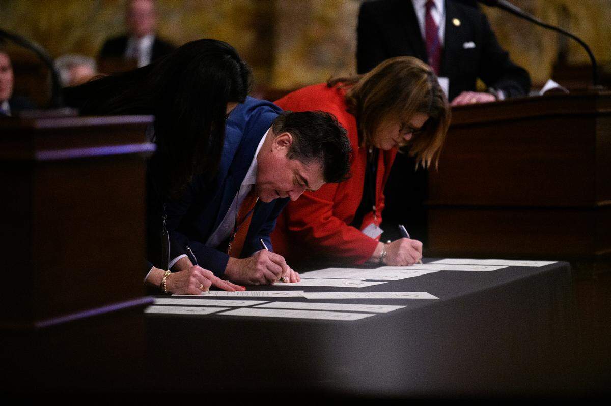 Electors for Donald Trump certify the results of the 2024 presidential election during Pennsylvania’s 60th Electoral College in Harrisburg.