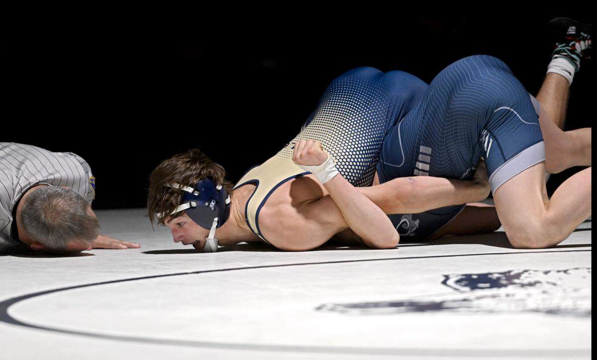 Bald Eagle Area’s Mason Reese pins Penns Valley’s Sawyer Fetterolf in the 145 lb bout of the match on Thursday, Jan. 24, 2024.