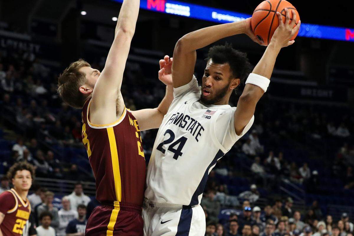 Feb 4, 2025; University Park, Pennsylvania, USA; Penn State Nittany Lions forward Zach Hicks (24) holds the ball as Minnesota Golden Gophers forward Parker Fox (23) defends during the first half at Bryce Jordan Center. Mandatory Credit: Matthew O'Haren-Imagn Images