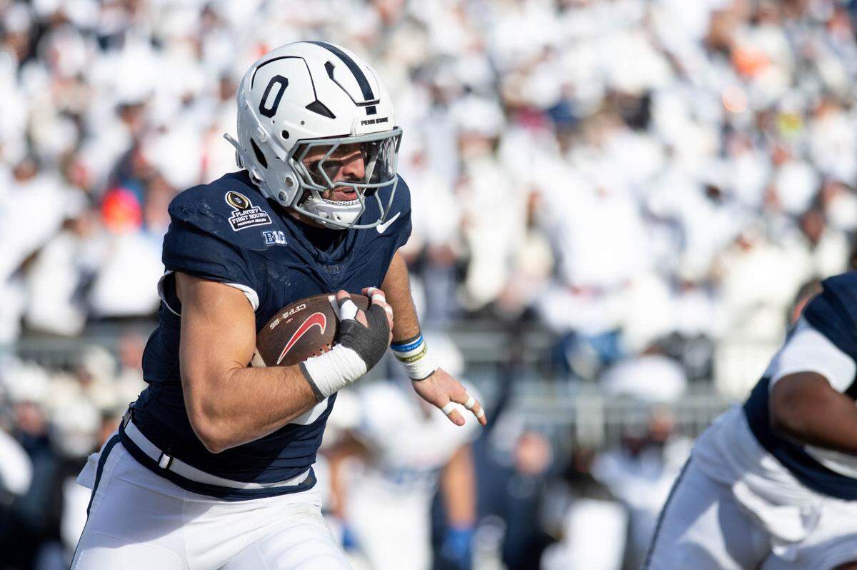 Penn State linebacker Dominic DeLuca (0) runs with the ball after making an interception during the college football playoff game against SMU at Beaver Stadium on Saturday, Dec. 21, 2024.