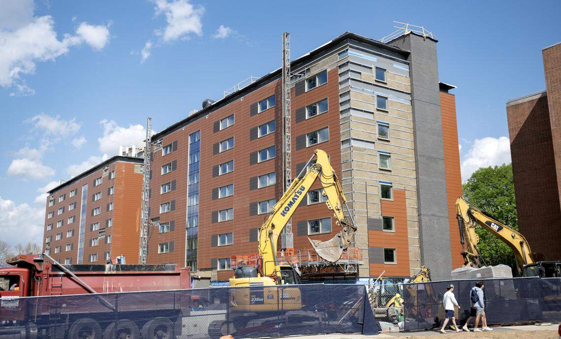 Students walk by as renovations to Wolf Hall and Ritner Hall continue on the Penn State campus on Wednesday, April 22, 2026.  
