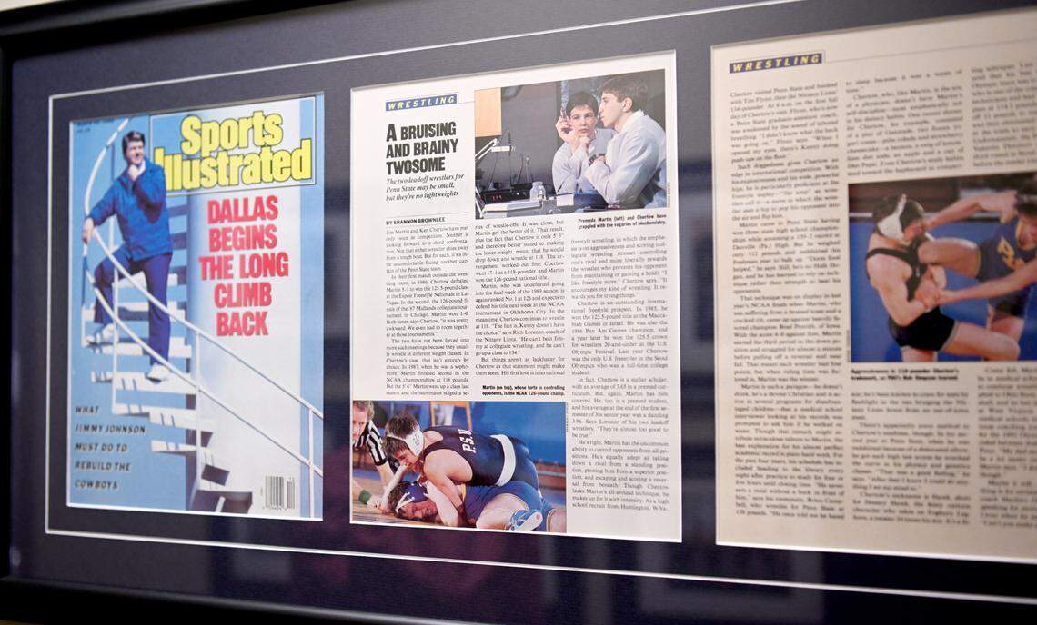 A Sports Illustrated article featuring Jim Martin when he was a Penn State wrestler hangs in the hallway at Mount Nittany Orthopedics on Saturday, March 23, 2024.