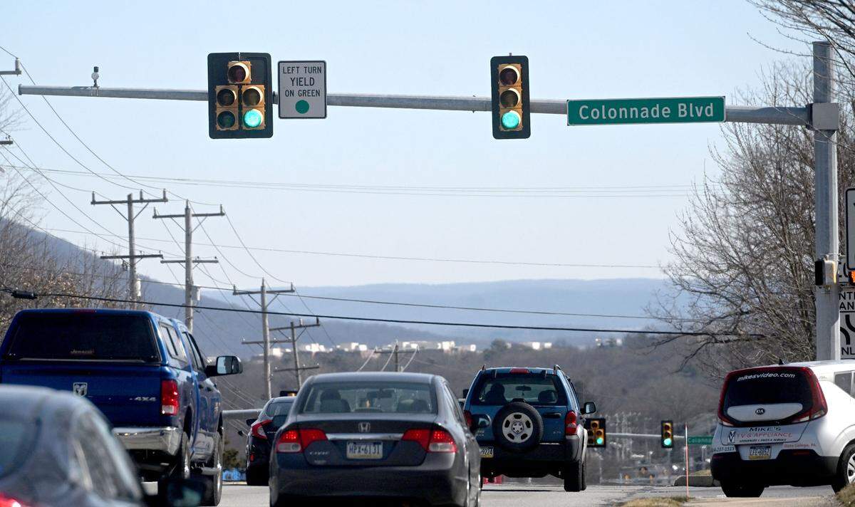 Traffic moves along North Atherton Street at the intersection with Colonnade Boulevard in Patton Township on Friday, March 1, 2024.