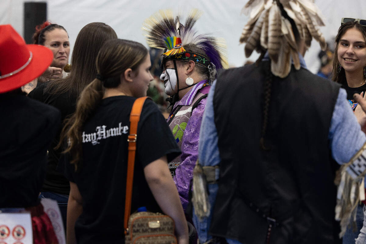 People talk at the Penn State 2025 Powwow on March 29, 2025 at C3 Sports Complex.