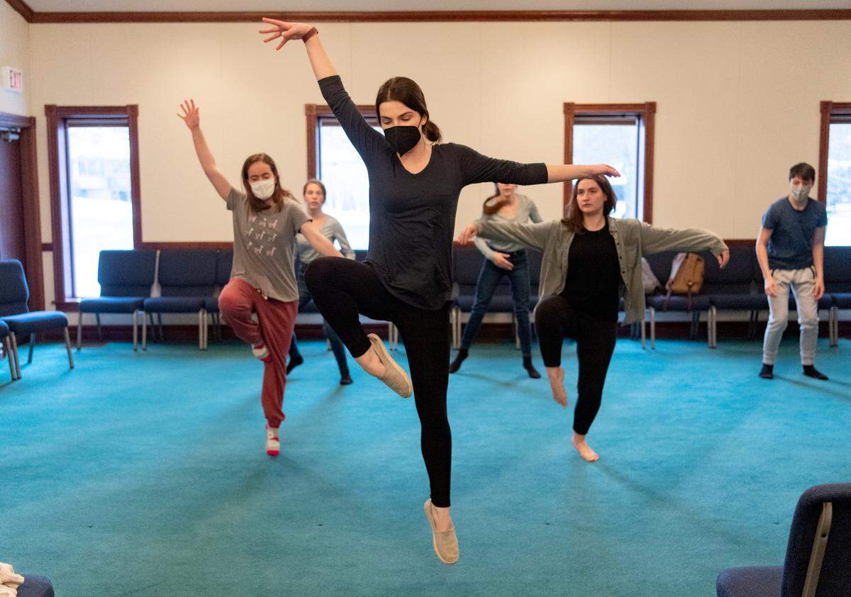 Rebecca Barker leads dancers through a choreographed piece during a Monday practice for “One Night For Change.”