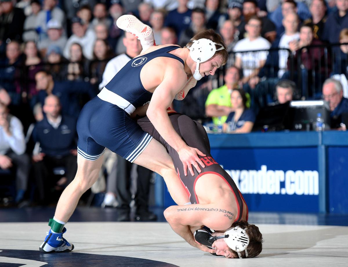 Penn State’s Jason Nolf scrambles with Nebraska’s Tyler Berger Sunday during the Nittany Lions’ 25-6 win at Rec Hall. Nolf defeated Berger 10-4.