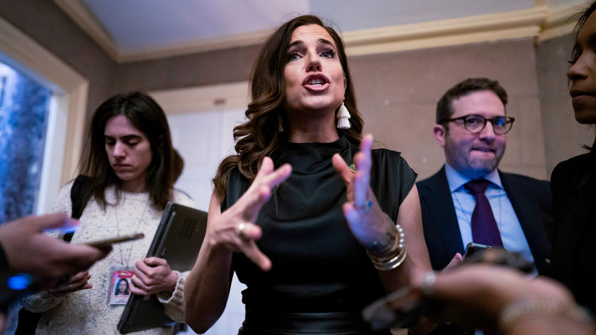 Rep. Nancy Mace, R-S.C., talks to reporters outside the office of Speaker of the House Kevin McCarthy, R-Calif., after she had openly opposed Republican efforts to kick Democratic Rep. lhan Omar, a Somali-born Muslim from Minnesota, from the House Foreign Affairs Committee, at the Capitol in Washington, Thursday, Feb. 2, 2023. (AP Photo/J. Scott Applewhite)