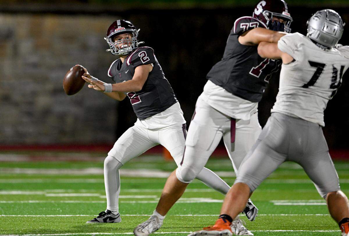 State College’s Eddie Corkery makes a pass during the game against Harrisburg on Friday, Oct. 13, 2023.
