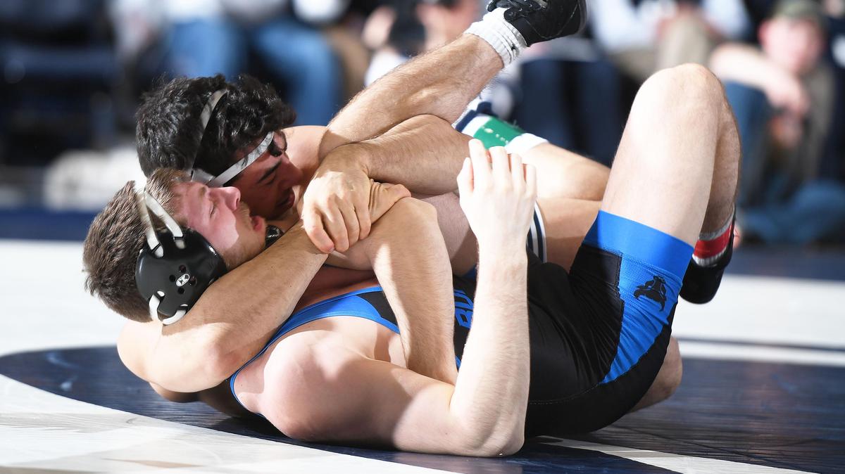 Penn State’s Vincenzo Joseph (rear) pins Buffalo’s Noah Grover at 165 lbs Sunday at Recreational Hall. Penn State defeated Buffalo, 47-3.