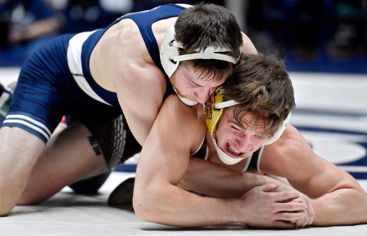 Penn State’s Nick Lee controls Lehigh’s Connor McGonagle in the 141 lb bout during the match on Sunday, Dec. 5, 2021 at Rec Hall. Penn State won, 23-16.