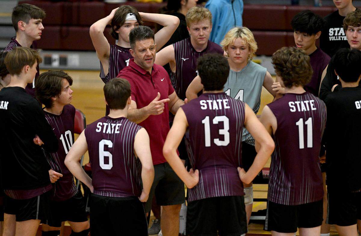 State College boys volleyball coach Larry Campbell talks to the player during a timeout of the game against Central Dauphin on Wednesday, May 10, 2023.