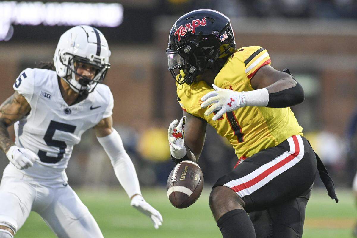 Nov 4, 2023; College Park, Maryland, USA;\h7o]\ drops as pass as Penn State Nittany Lions cornerback Cam Miller (5) closes during the second half   at SECU Stadium. Mandatory Credit: Tommy Gilligan-USA TODAY Sports