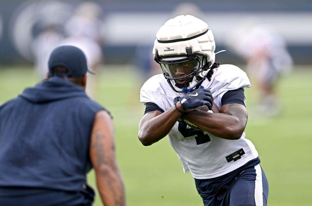 Penn State wide receiver Tyseer Denmark runs a drill during practice on Thursday, Aug. 8, 2024. 