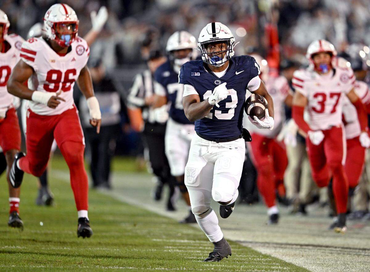Penn State running back Kaytron Allen breaks away from Nebraska defenders during the game on Saturday, Nov. 22, 2025 at Beaver Stadium.